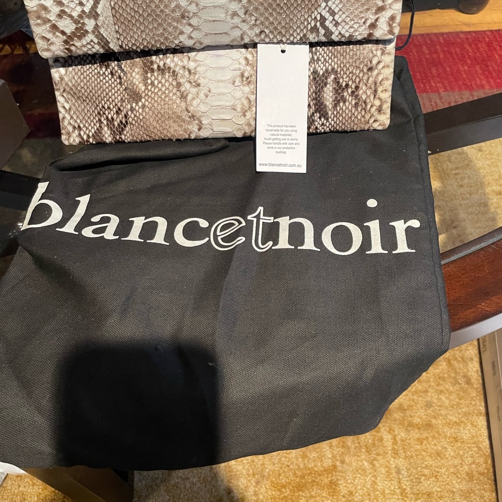 New With Dust Bag and  Tags Genuine Leather Brown  Python Blancet Noir Clutch